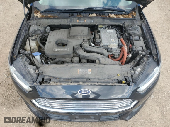 2013 Ford Fusion SE Hybrid с VIN 3FA6P0LU2DR181215, выставлен на аукционе Copart как лот 62474965 с пробегом 149 492 миль миль и Списание • Salvage title. История ставок и продаж доступна на DreamBid. Изображение 11.