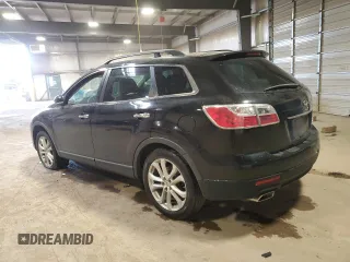 2012 Mazda CX-9 Grand Touring с VIN JM3TB3DV0C0365983, выставлен на аукционе Copart как лот 48670515 с пробегом 108 543 миль миль и Списание • Salvage title. История ставок и продаж доступна на DreamBid. Изображение 2.