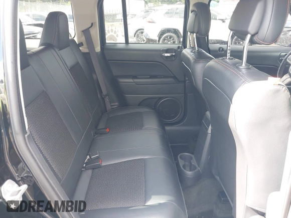 2016 Jeep Patriot Sport with VIN 1C4NJRBB5GD709029, listed as a IAAI auction lot 42303032 with 73,549 mi miles and . Bid and sale history available at DreamBid. Image 8.