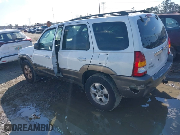 2004 Mazda Tribute ES with VIN 4F2CZ06164KM12579, listed as a IAAI auction lot 41654646 with 208,120 mi miles. Bid and sale history available at carsss.com. Image 3.