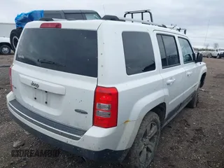 2016 Jeep Patriot High Altitude Edition with VIN 1C4NJRFB9GD808902, listed as a IAAI auction lot 41919059 with 123,265 mi miles. Bid and sale history available at carsss.com. Image 4.