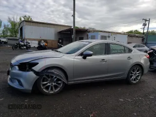 2014 Mazda 6 i Grand Touring with VIN JM1GJ1W67E1116357, listed as a Copart auction lot 54351205 with 111,190 mi miles and Salvage Title. Bid and sale history available at DreamBid. Image 1.