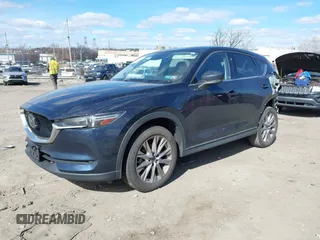 2020 Mazda CX-5 Grand Touring with VIN JM3KFBDM2L0768770, listed as a IAAI auction lot 41695058 with 44,192 mi miles. Bid and sale history available at carsss.com. Image 2.