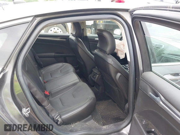 2016 Ford Fusion Titanium with VIN 3FA6P0D97GR133823, listed as a IAAI auction lot 42429708 with 166,105 mi miles and . Bid and sale history available at DreamBid. Image 8.
