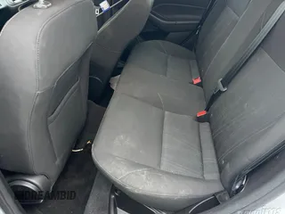 2017 Ford Focus SE with VIN 1FADP3F21HL223218, listed as a IAAI auction lot 42273348 with 180,448 mi miles and . Bid and sale history available at DreamBid. Image 6.