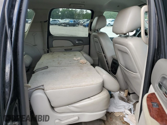 2012 Chevrolet Suburban LT с VIN 1GNSCJE01CR214873, выставлен на аукционе Copart как лот 58316385 с пробегом 266 398 миль миль и Списание • Salvage title. История ставок и продаж доступна на DreamBid. Изображение 11.