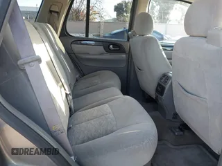 2005 GMC Envoy SLT with VIN 1GKDT13S152373799, listed as a IAAI auction lot 41537512 with 187,750 mi miles. Bid and sale history available at carsss.com. Image 8.