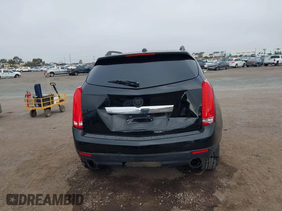 2015 Cadillac SRX with VIN 3GYFNAE37FS598023, listed as a IAAI auction lot 41198546 with 127,373 mi miles and . Bid and sale history available at carsss.com. Image 16.