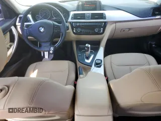 2018 BMW 3 Series 320i xDrive with VIN WBA8A3C55JA357532, listed as a Copart auction lot 57561015 with 46,876 mi miles and Salvage title. Bid and sale history available at DreamBid. Image 8.