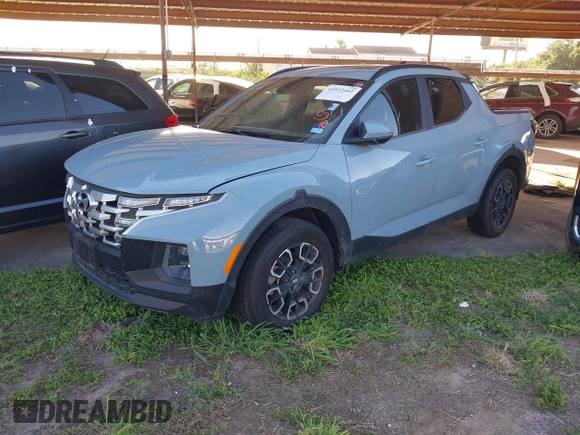 2022 Hyundai Santa Cruz SEL Premium z VIN 5NTJDDAF3NH012433, wystawiony jako IAAI lot #41922462 z przebiegiem 72 880 mil mil oraz . Historia ofert i sprzedaży dostępna na DreamBid. Obrazek 2.
