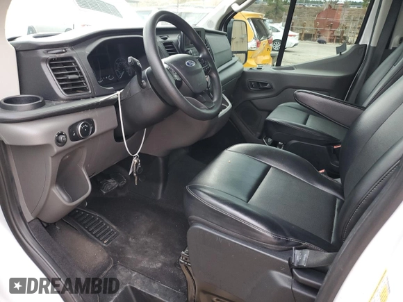 2020 Ford Transit Cargo with VIN 1FTYE1Y81LKA70748, listed as a Copart auction lot 80916514 with 104,077 mi miles and Salvage Title. Bid and sale history available at DreamBid. Image 7.