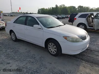 2005 Toyota Camry STD with VIN 4T1BE32K85U401432, listed as a IAAI auction lot 42093301 with 228,557 mi miles. Bid and sale history available at carsss.com. Image 1.