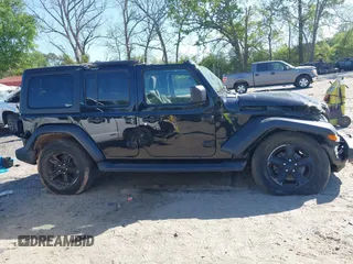 2019 Jeep Wrangler Unlimited Sport S with VIN 1C4HJXDG7KW671598, listed as a IAAI auction lot 42059734 with 63,899 mi miles and . Bid and sale history available at DreamBid. Image 13.