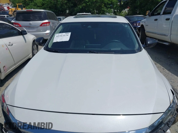2021 Honda Accord Touring with VIN 1HGCV2F98MA015203, listed as a IAAI auction lot 42313124 with 55,530 mi miles and . Bid and sale history available at DreamBid. Image 12.