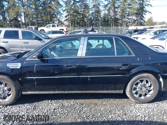 2006 Cadillac DTS 1SC z VIN 1G6KD57YX6U100634, wystawiony jako IAAI lot #41671007 z przebiegiem Nie podano mil oraz . Historia ofert i sprzedaży dostępna na DreamBid. Obrazek 14.