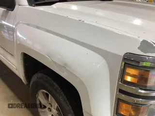 2015 Chevrolet Silverado 1500 LT with VIN 1GCRCREC0FZ257752, listed as a IAAI auction lot 42298229 with 132,830 mi miles and . Bid and sale history available at DreamBid. Image 39.
