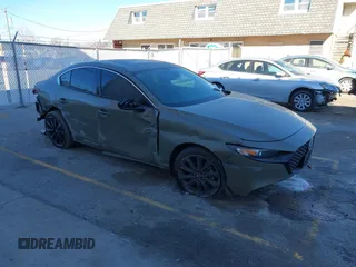 2024 Mazda 3 Carbon Edition with VIN 3MZBPBXY0RM404743, listed as a IAAI auction lot 41291652 with 18,231 mi miles and . Bid and sale history available at DreamBid. Image 1.
