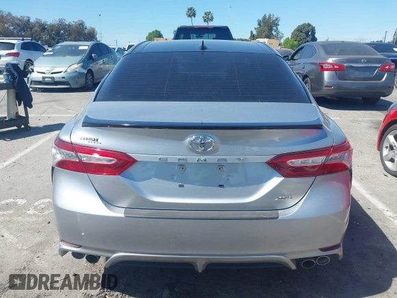2020 Toyota Camry XSE with VIN 4T1K61AK1LU318098, listed as a IAAI auction lot 41838182 with 64,118 mi miles and . Bid and sale history available at DreamBid. Image 16.