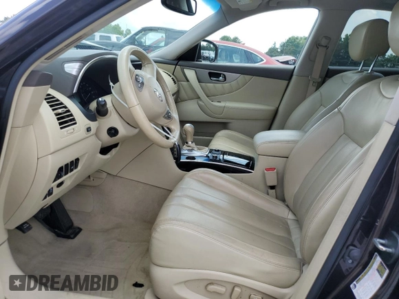 2017 Infiniti QX70 z VIN JN8CS1MW2HM412523, wystawiony jako Copart lot #57143005 z przebiegiem 79 564 mil mil oraz Szkoda całkowita • Salvage title. Historia ofert i sprzedaży dostępna na DreamBid. Obrazek 7.