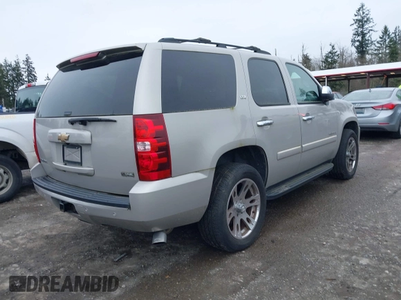 2007 Chevrolet Tahoe LTZ with VIN 1GNFK13047J373205, listed as a IAAI auction lot 41830747 with 182,361 mi miles and . Bid and sale history available at DreamBid. Image 4.