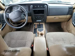 2000 Jeep Cherokee with VIN 1J4FF48S3YL149593, listed as a Copart auction lot 52489045 with 290,231 mi miles and Salvage title. Bid and sale history available at DreamBid. Image 8.