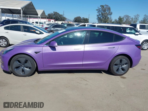 2020 Tesla Model 3 Standard Range Plus with VIN 5YJ3E1EA0LF739462, listed as a IAAI auction lot 42081889 with 65,254 mi miles. Bid and sale history available at carsss.com. Image 14.