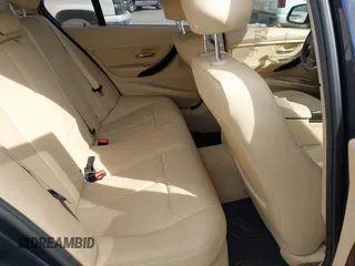 2015 BMW 3 Series 320i with VIN WBA3B1G53FNT07024, listed as a IAAI auction lot 41730253 with 66,684 mi miles. Bid and sale history available at carsss.com. Image 8.