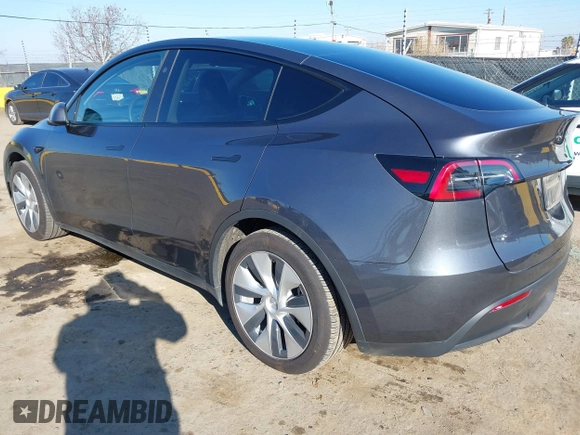 2023 Tesla Model Y Long Range with VIN 7SAYGAEE5PF964083, listed as a IAAI auction lot 41365919 with 26,008 mi miles and . Bid and sale history available at carsss.com. Image 3.