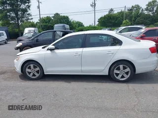 2014 Volkswagen Jetta TDI w/Premium/Nav with VIN 3VWLL7AJ4EM430524, listed as a IAAI auction lot 42268673 with 137,721 mi miles and . Bid and sale history available at DreamBid. Image 13.