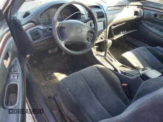 2000 Toyota Solara SE with VIN 2T1CF22P7YC263427, listed as a Copart auction lot 76457634 with Not Provided miles and Salvage Title. Bid and sale history available at DreamBid. Image 8.