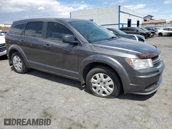 2014 Dodge Journey American Value Pkg with VIN 3C4PDCAB8ET256983, listed as a Copart auction lot 54976545 with 184,764 mi miles and Clean Title. Bid and sale history available at carsss.com. Image 4.