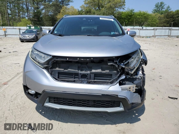 2018 Honda CR-V Touring with VIN 7FARW1H9XJE001467, listed as a Copart auction lot 55222005 with 65,611 mi miles and Salvage title. Bid and sale history available at DreamBid. Image 5.