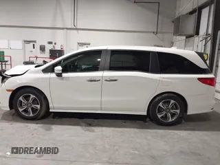 2019 Honda Odyssey Touring with VIN 5FNRL6H83KB051363, listed as a IAAI auction lot 41173587 with 88,512 mi miles. Bid and sale history available at carsss.com. Image 13.