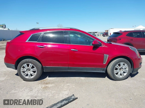 2014 Cadillac SRX with VIN 3GYFNAE36ES597007, listed as a IAAI auction lot 41675527 with 105,613 mi miles and . Bid and sale history available at DreamBid. Image 13.