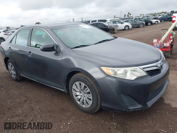 2014 Toyota Camry L with VIN 4T1BF1FK5EU403313, listed as a IAAI auction lot 42141338 with 185,925 mi miles and . Bid and sale history available at DreamBid. Image 1.
