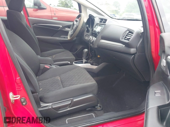 2017 Honda Fit LX z VIN 3HGGK5H58HM705063, wystawiony jako IAAI lot #41962906 z przebiegiem 163 835 mil mil oraz . Historia ofert i sprzedaży dostępna na DreamBid. Obrazek 5.