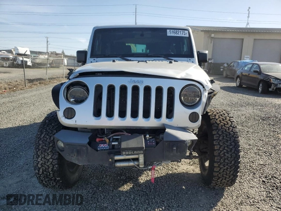 2012 Jeep Wrangler Sport z VIN 1C4AJWAG3CL151885, wystawiony jako Copart lot #51682175 z przebiegiem 111 544 mil mil oraz Szkoda całkowita • Salvage title. Historia ofert i sprzedaży dostępna na DreamBid. Obrazek 5.