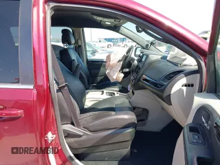 2017 Dodge Grand Caravan SXT with VIN 2C4RDGCG6HR629633, listed as a IAAI auction lot 41997303 with 128,898 mi miles and . Bid and sale history available at DreamBid. Image 5.