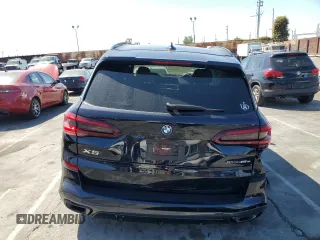 2023 BMW X5 xDrive45e with VIN 5UXTA6C06P9R89208, listed as a Copart auction lot 50352635 with 0 mi miles and Salvage Title. Bid and sale history available at carsss.com. Image 6.