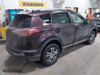 2018 Toyota RAV4 LE with VIN 2T3BFREVXJW737378, listed as a IAAI auction lot 41355320 with 58,609 mi miles. Bid and sale history available at carsss.com. Image 4.