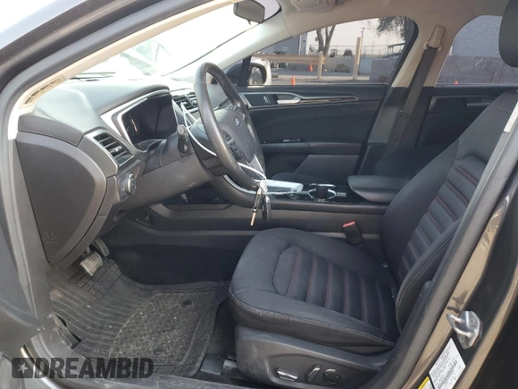 2016 Ford Fusion SE Hybrid z VIN 3FA6P0LU2GR342876, wystawiony jako Copart lot #65036385 z przebiegiem 118 832 mil mil oraz Czysty tytuł • Clean title. Historia ofert i sprzedaży dostępna na DreamBid. Obrazek 7.