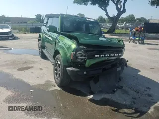 2022 Ford Bronco z VIN 1FMDE5BHXNLA88611, wystawiony jako Copart lot #58135415 z przebiegiem 15 448 mil mil oraz Nie do naprawy • Non repairable. Historia ofert i sprzedaży dostępna na DreamBid. Obrazek 15.