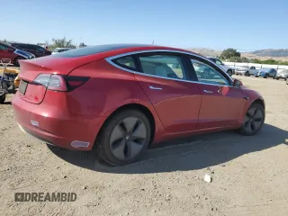 2019 Tesla Model 3 Mid Range z VIN 5YJ3E1EA3KF312453, wystawiony jako Copart lot #57841605 z przebiegiem 77 366 mil mil oraz Szkoda całkowita • Salvage title. Historia ofert i sprzedaży dostępna na DreamBid. Obrazek 3.