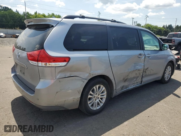 2012 Toyota Sienna XLE AAS with VIN 5TDYK3DC0CS194193, listed as a Copart auction lot 60265455 with 139,246 mi miles and Salvage title. Bid and sale history available at DreamBid. Image 3.