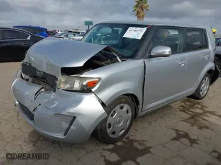 2009 Scion xB with VIN JTLKE50E691089958, listed as a IAAI auction lot 41700775 with 129,396 mi miles. Bid and sale history available at carsss.com. Image 2.