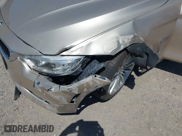 2015 BMW 4 Series 435i xDrive with VIN WBA3T7C51FP942320, listed as a IAAI auction lot 42584318 with 81,814 mi miles and . Bid and sale history available at DreamBid. Image 6.