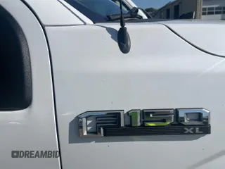 2018 Ford F-150 XL with VIN 1FTFX1E53JKE97440, listed as a IAAI auction lot 42143157 with 106,449 mi miles. Bid and sale history available at carsss.com. Image 1.