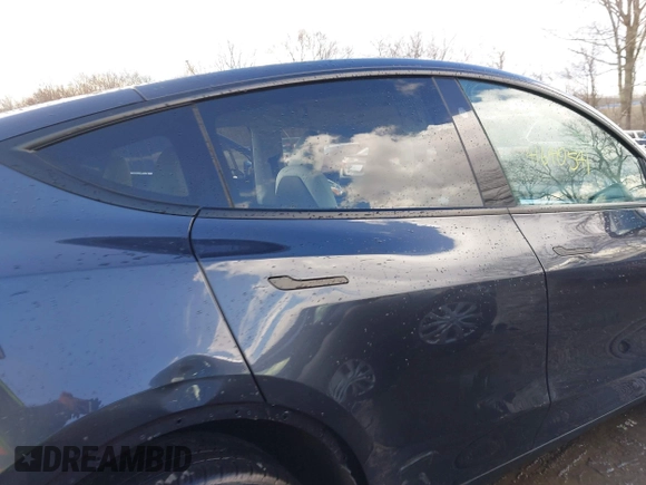 2024 Tesla Model Y Long Range with VIN 7SAYGDEE0RA300064, listed as a IAAI auction lot 41640541 with 5,049 mi miles and . Bid and sale history available at DreamBid. Image 14.