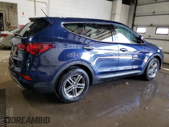 2018 Hyundai Santa Fe 2.4L z VIN 5XYZTDLB4JG553894, wystawiony jako Copart lot #56859585 z przebiegiem 97 313 mil mil oraz Szkoda całkowita • Salvage title. Historia ofert i sprzedaży dostępna na DreamBid. Obrazek 3.