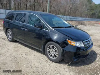 2011 Honda Odyssey EX with VIN 5FNRL5H44BB075498, listed as a IAAI auction lot 41807586 with 128,869 mi miles. Bid and sale history available at carsss.com. Image 1.